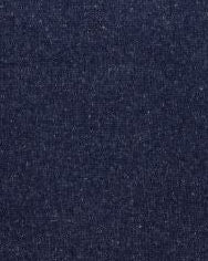 Navy blue sweater with a quarter zip on a light gray background