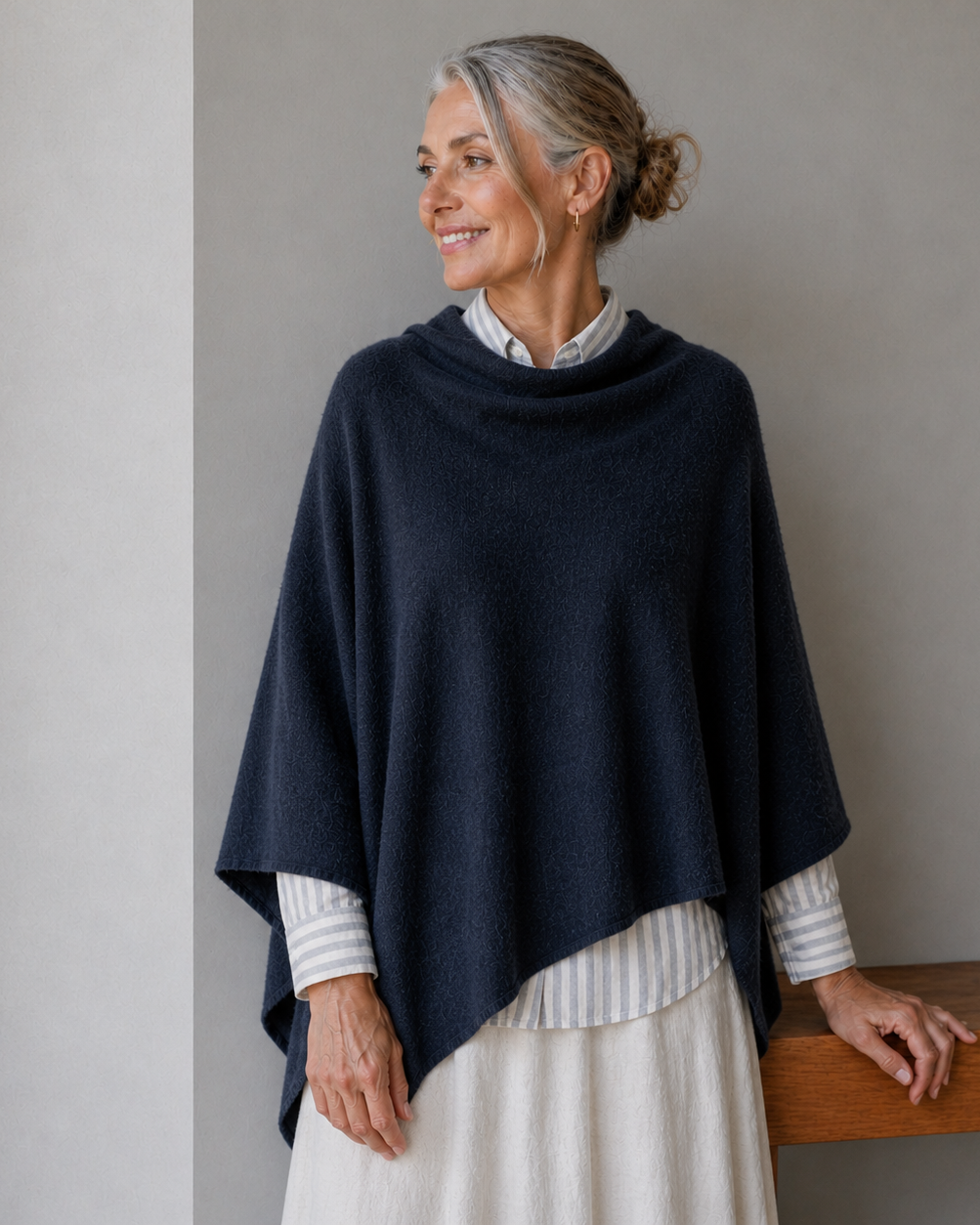 Women in blue poncho