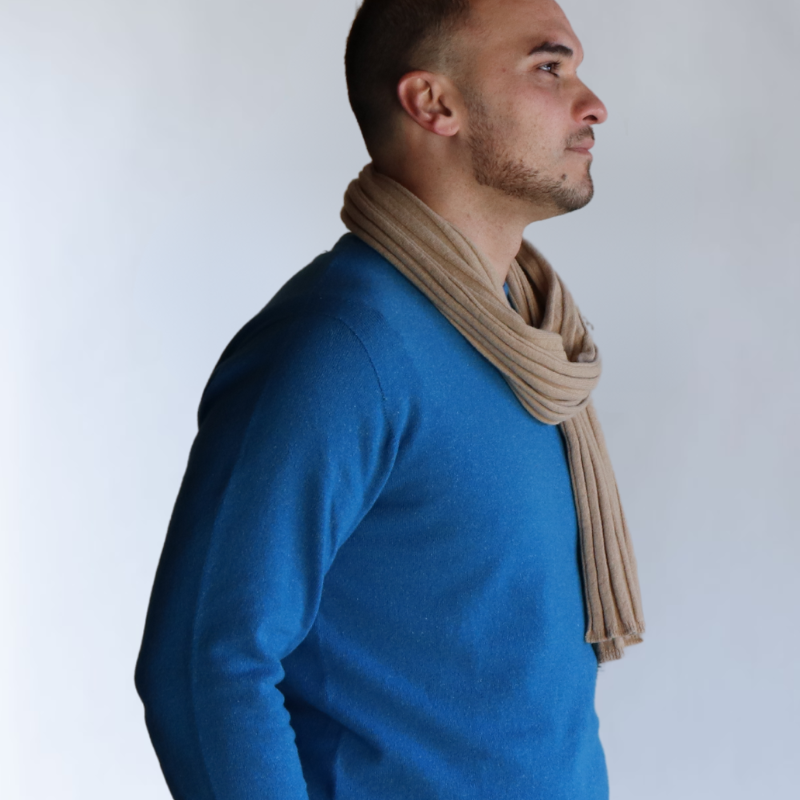 Bright blue jersey, worn with a beige rib knit scarf. Knitwear brand Hemprino, made from hemp and merino from Glenaan Station.