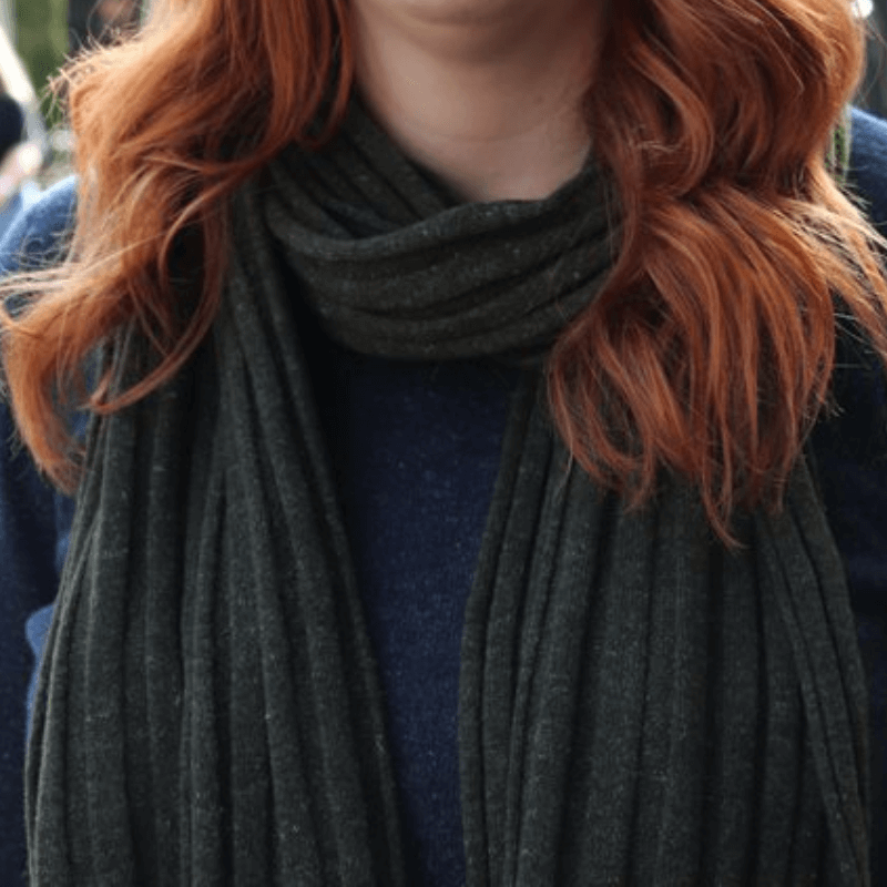 Forrest green scarf made from hemp and merino, worn by red head women with beanie on.