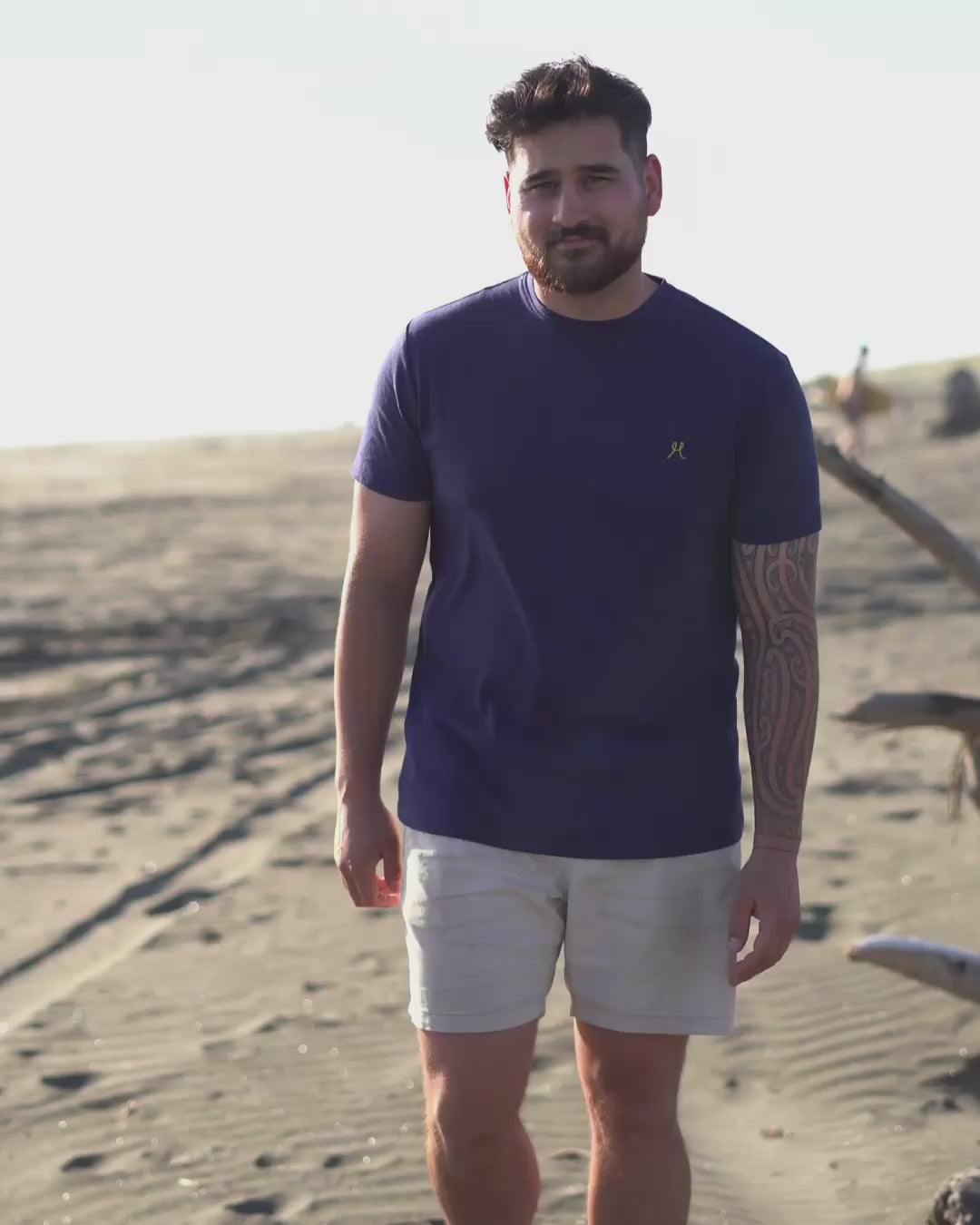Man in Navy Tshirt on beach