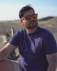 Man in Navy Tshirt on Beach